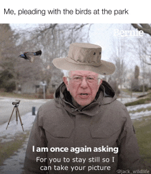 a man in a hat says " i am once again asking for you to stay still "