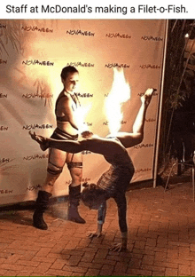 a woman is doing a handstand in front of a sign that says novaheen