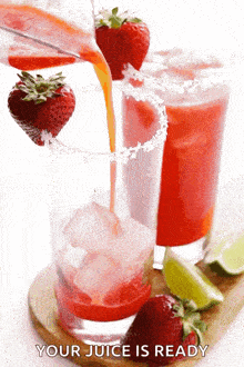 a strawberry margarita being poured into a glass