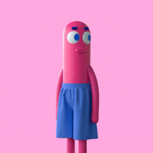 a pink cartoon character with a surprised expression on his face
