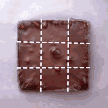 a piece of chocolate is divided into four sections with white lines