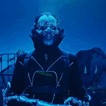a person with a mask on their face and a belt that says ' n ' on it