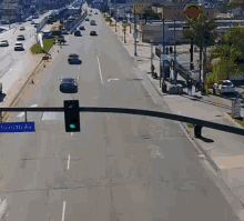a busy street with a blue sign that says clauson av