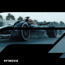 a picture of a race car with the hashtag #f1movie on the bottom