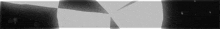 a black and white photo of a person 's face with a white border .