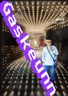 a man singing into a microphone in front of a sign that says ' celebrity '