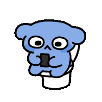 a blue cartoon character is sitting on a toilet with a cell phone in his mouth .