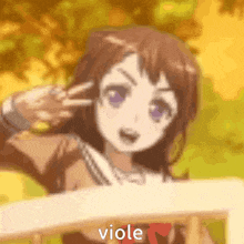 a girl with purple eyes is making a peace sign and the word viole is visible in the corner .