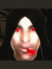 a close up of a person 's face with red hearts in his eyes
