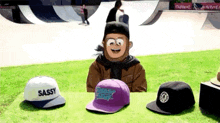 a cartoon character is sitting at a table with three hats one of which has the word sassy on it