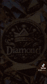 a diamond community logo is surrounded by diamonds