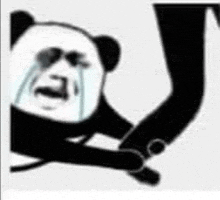 a panda bear is crying while holding a sword .