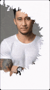 a man wearing a white shirt and a black watch