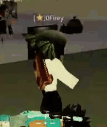 a person is standing in a room in a video game with a hat on .