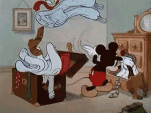 Mickey Mouse Clothes GIF - Mickey Mouse Clothes Packing Up GIFs