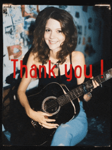 a picture of a woman holding a guitar with the words thank you written in red