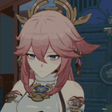 a girl with pink hair and blue eyes is standing in front of a blue door