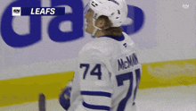 a hockey player wearing a number 74 jersey