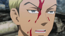 a close up of a man 's face with blood coming out of it