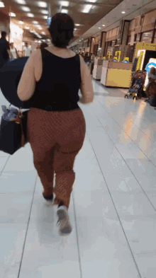 running airport woman late rushing