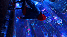 a man in a red hat is hanging upside down in the air