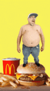 a man standing on top of a mcdonalds hamburger