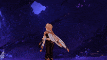 a man and a woman are standing in a cave
