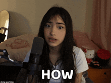 a girl with a microphone and the word how on the bottom