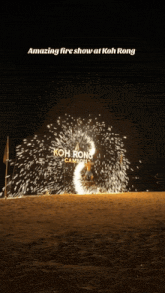 a fire show at koh rong cambodia is displayed at night