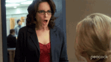 a peacock ad shows a woman making a shocked face