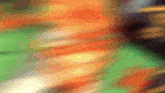 a blurred image of a colorful background with a rainbow of colors .