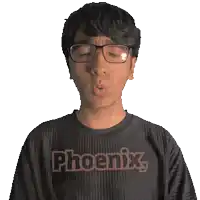 a man wearing glasses and a phoenix shirt
