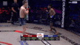 a fighter named hughes is fighting a fighter named miranda in a cage