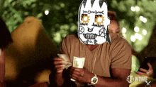 a man holding a bunch of money with a showtime logo on the bottom right