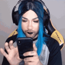 samira close mustache texting blue hair