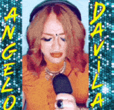 a woman wearing headphones is holding a microphone in front of a sign that says davila