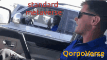 a man is sitting in a car with the words standard metaverse written on the bottom