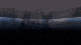 a blurry image of a person 's face with the letter v visible in the middle