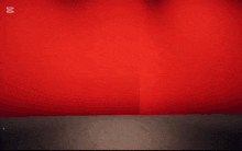 a cartoon scene with a red curtain and a caption that says capcut