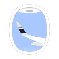 an airplane window shows the wing of a plane in the sky