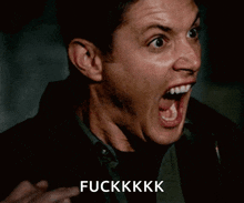a man with his mouth open and the words fuckkkk written below him