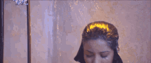 a naked woman is taking a shower and the word time is on the bottom