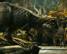 a t-rex with a very large mouth is standing next to a smaller t-rex