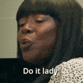 a close up of a woman 's face with the words do it lady behind her