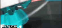 a close up of a beyblade spinning on a table