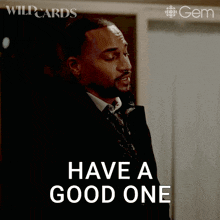 a man in a suit is saying have a good one