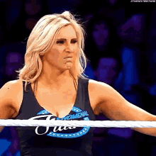 Charlotte Flair Not Impressed GIF - Charlotte Flair Not Impressed Brush Shoulders GIFs