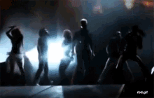 a blurred image of a group of people dancing with the url rbd.gif at the bottom