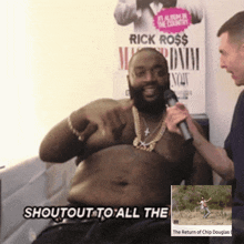 a man is holding a microphone in front of a rick ross album in the country poster
