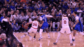 a basketball player with the number 30 on his jersey dribbles the ball